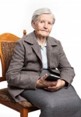 Senior woman sitting on chair